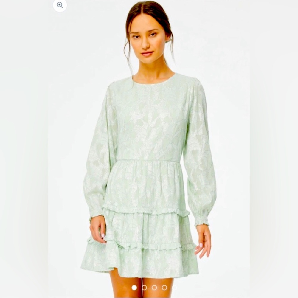 Brand New ROLLER RABBIT Dress with tassel belt. Has tags never worn size XS.